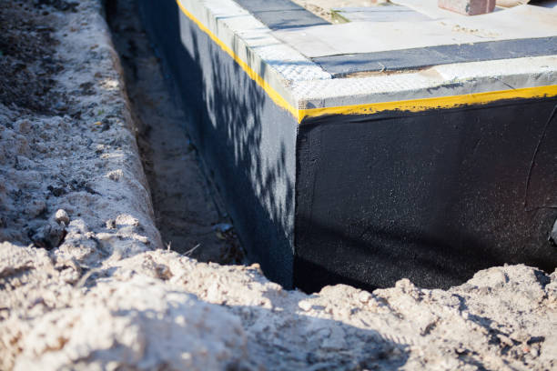 Professional Basement Waterproofing technician working in Nottingham, MD